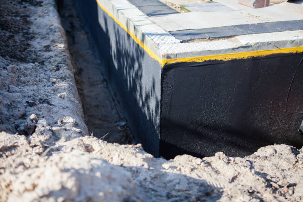 Professional Waterproofing technician working in Marshall, IL